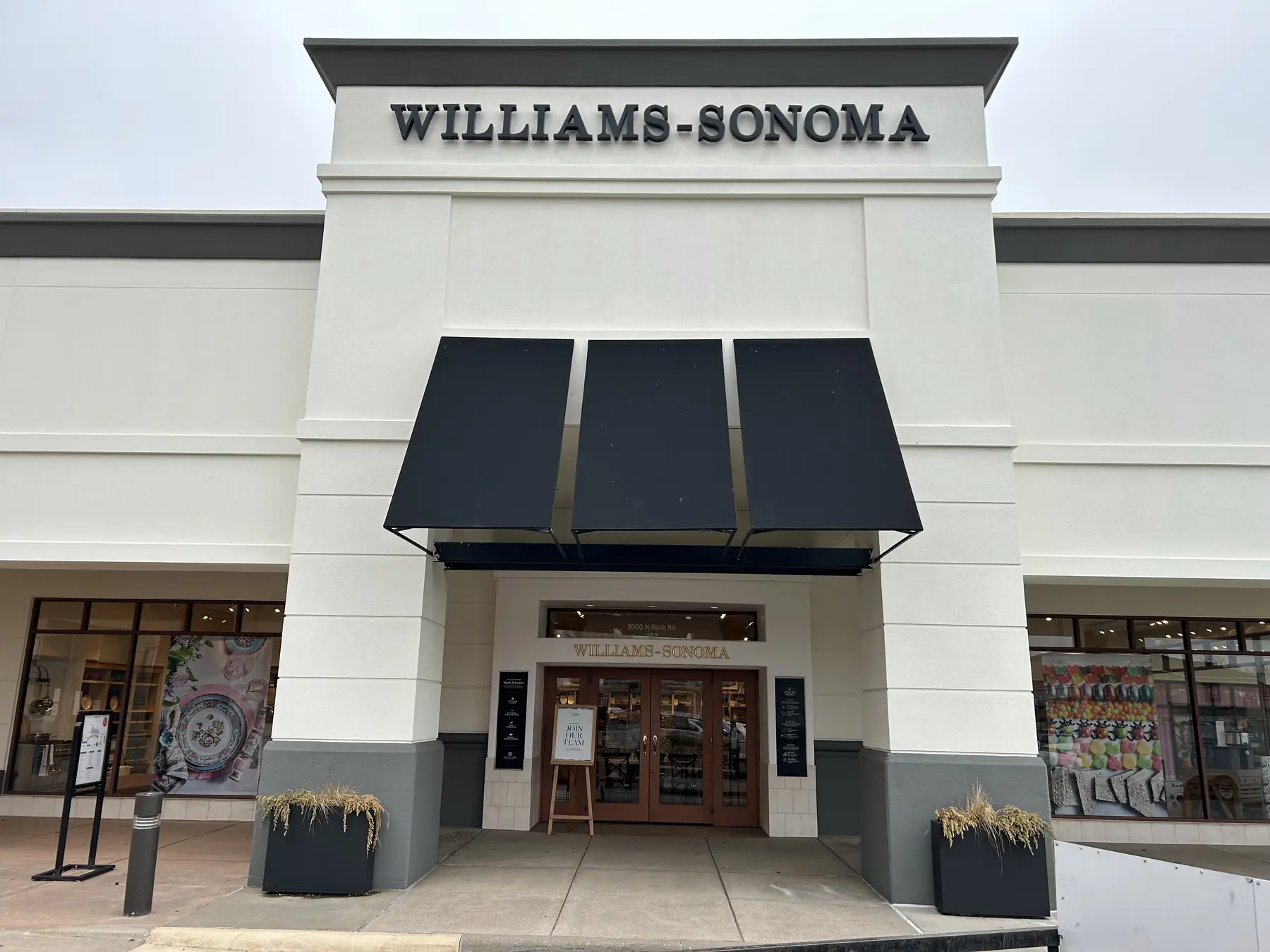 Commercial awnings coordinated with storefront signage