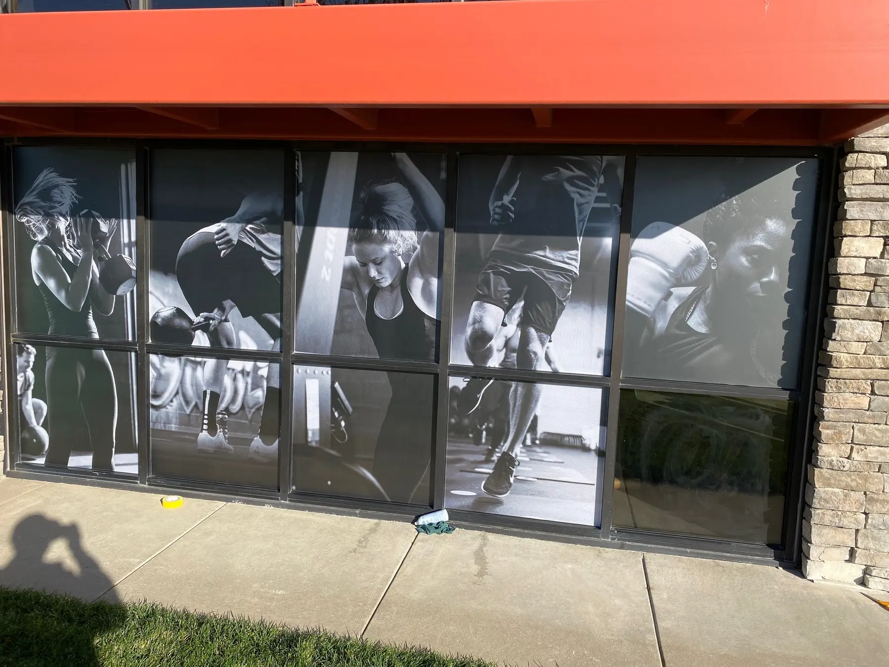 Full-height commercial window graphics installed by Endura